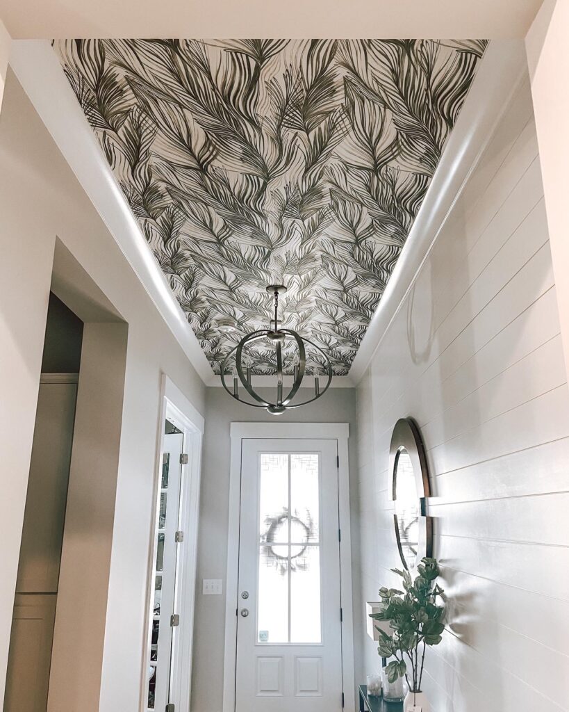 York Wallcoverings' Peaceful Plume in Green and Gold installed on a ceiling by Eleven Walls